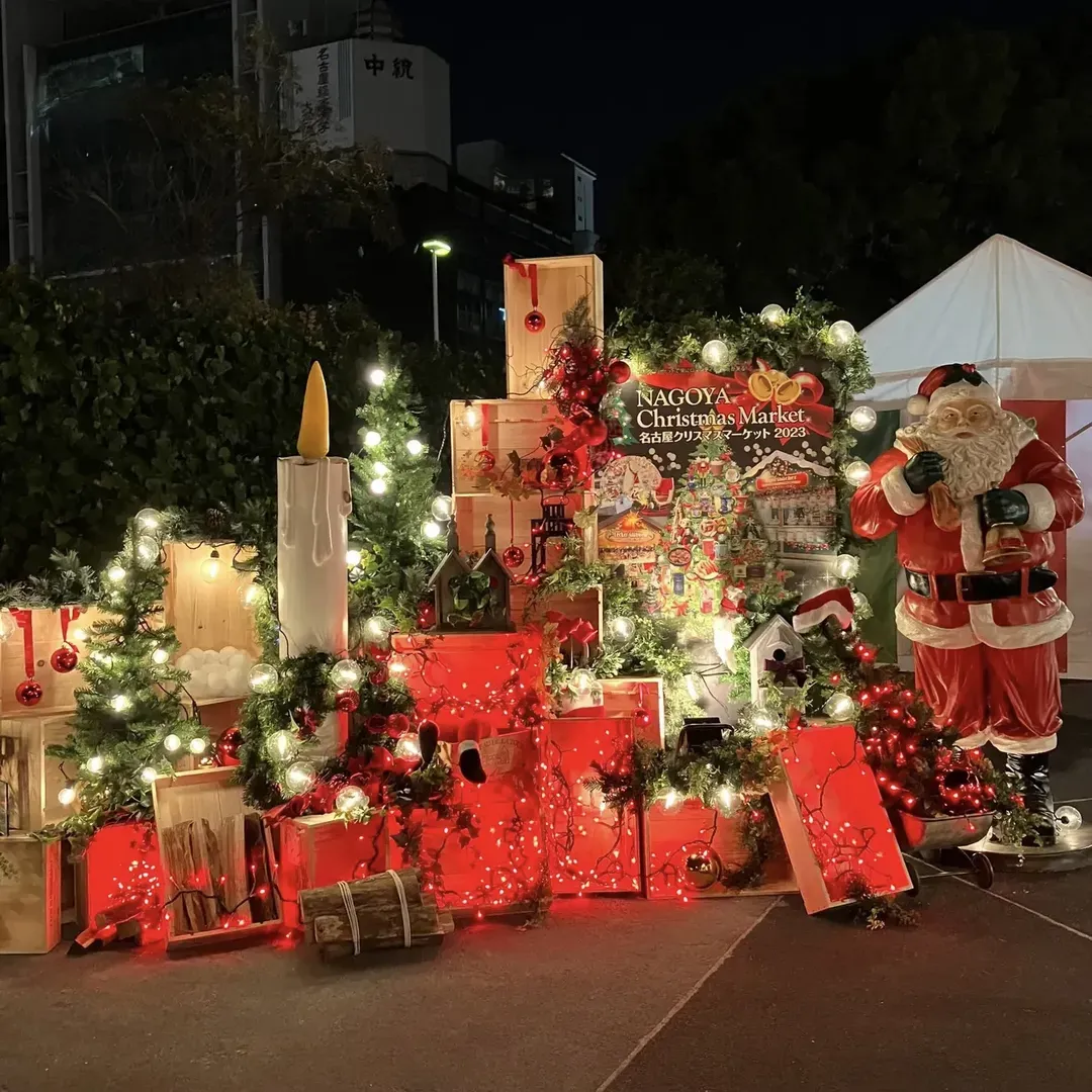 Decorative Christmas presents, lights, and a Santa statue at the Nagoya Christmas Market in Hisaya Odori Park, Japan.