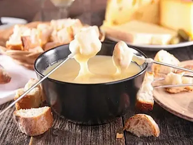 Win a FREE Fondue Dinner at Tom's Cafe!